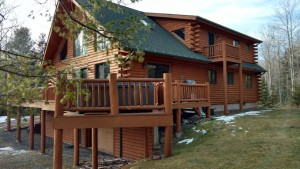 Hot Tub Decks: The new owners of this handsome log home in Windham, NY, found they had to replace the existing 15-year old hot tub with a new one. After learning about the many benefits of a Bullfrog Spas at our Best Hot Tubs showroom, they chose Bullfrog’s X7L model.