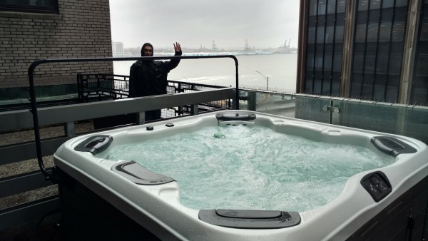 Hot Tub Winterization: Best Hot Tubs’ Techs winterize hot tubs even on top of city buildings.
