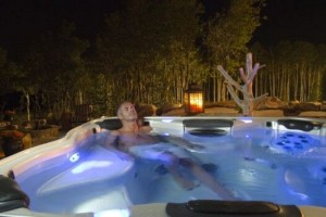 You’ll never feel more relaxed than resting in a hot tub that you know is clean inside and out. Photo: Bullfrog Spas
