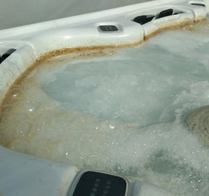 “Before” photo of hot tub where service visit had been prolonged