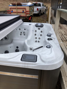 Fresh off the truck; old worn-out spa replaced with beautiful Bullfrog Spa from Best Hot Tubs, Ashland, NY.