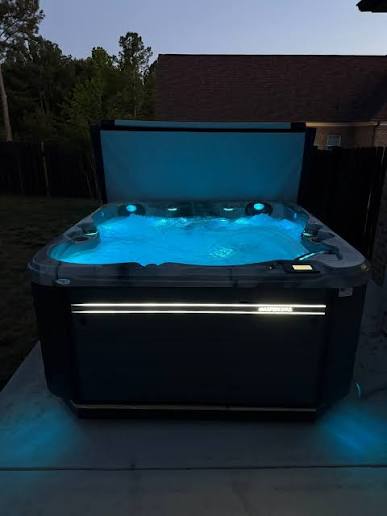 Aspen Spas offers lovely exterior lighting as seen in this Aspen Eldorado model