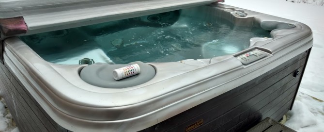 Best Hot Tubs’ Tech testing spa water for: Sanitizer, pH levels, Alkalinity and Calcium