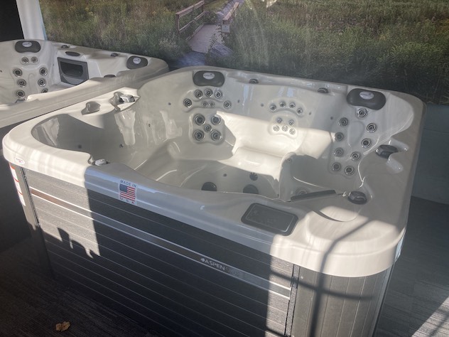 Empty hot tub in showroom for sale